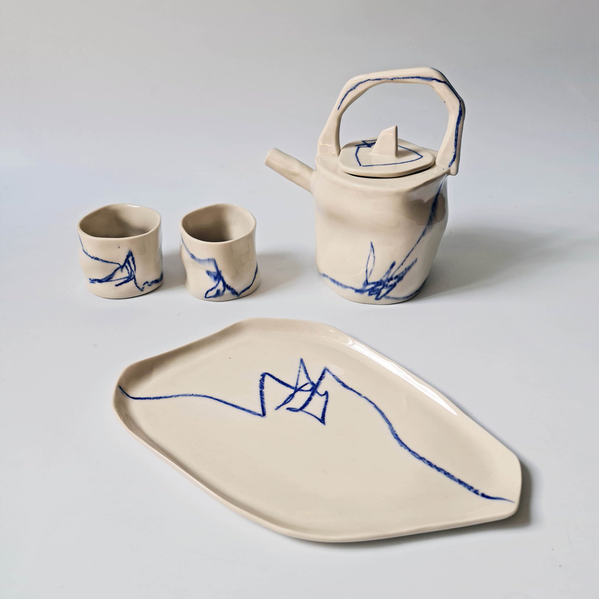 porcelain tea set with blue graphics<br />
