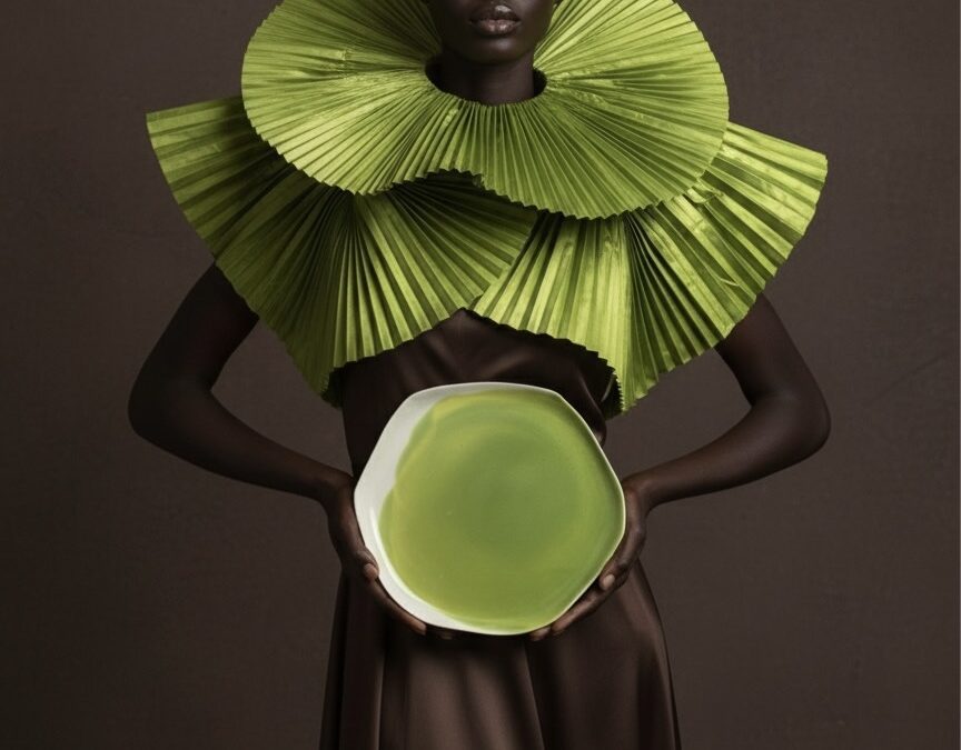 lady with green plate from pottery and poetry